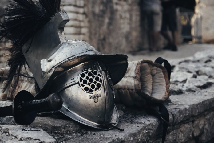 The helmet and sword depict Medieval period. Courtesy: Image by pixabay from Pexel