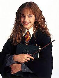 Figure : Hermione occasionally lets her hair down in loose waves or curls.