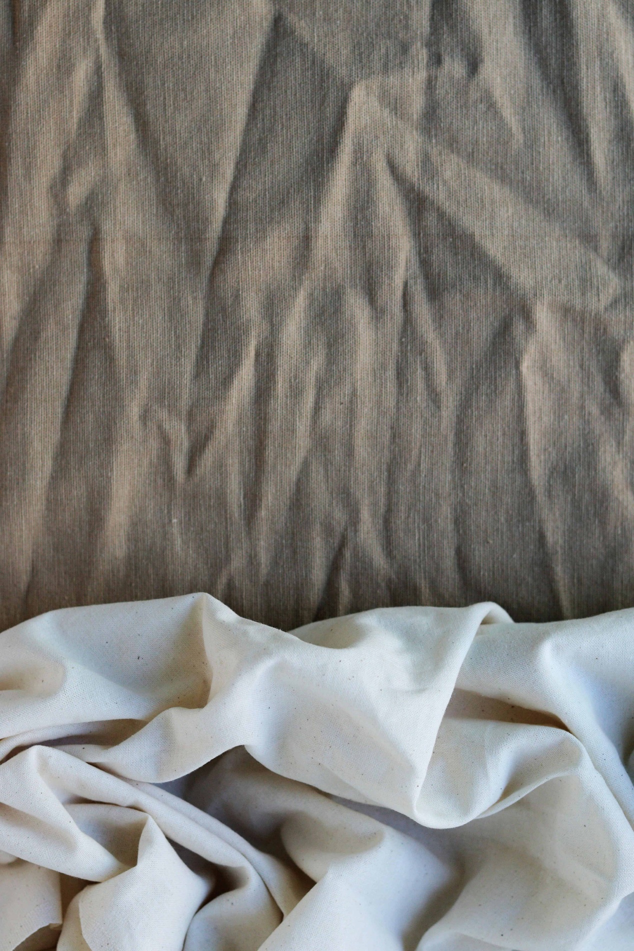 Close up detail of natural fabrics including cotton and linen texture