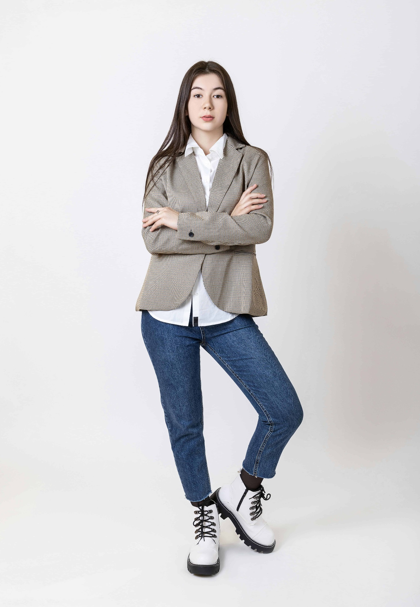 Smart casual outfit showing blazer jeans and elegant shoes combination