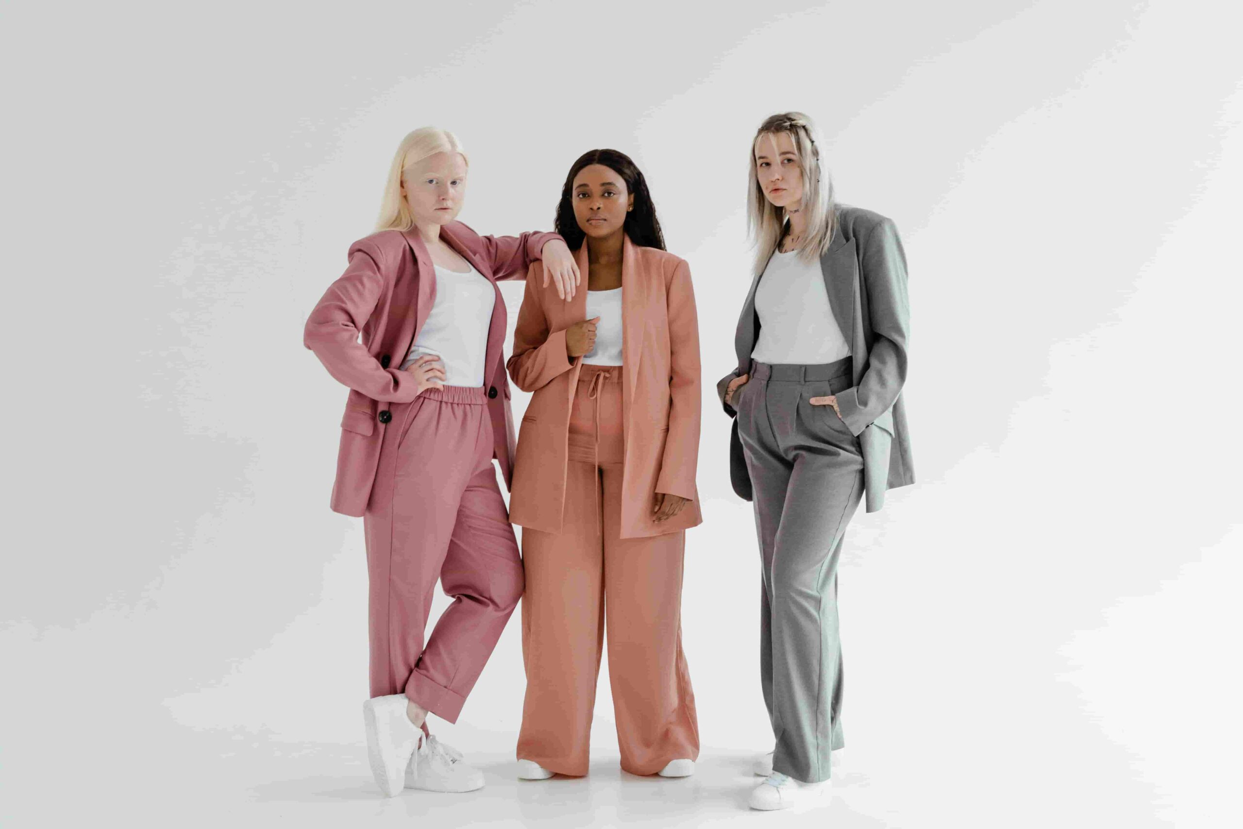 Business casual office outfit ideas for women showing blazer trousers and flats